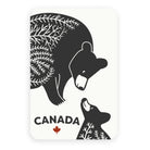 Canada sticker design with a black and white illustration of a black bear mama and cub looking fondly at each other, and the word 'Canada', and a red maple leaf on a white background.